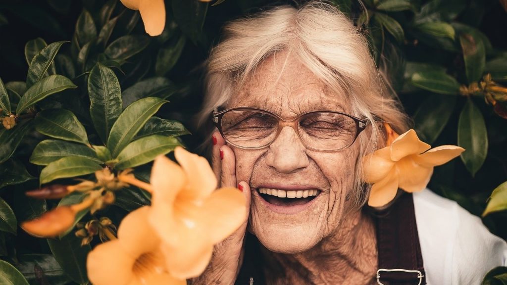 old woman smiling - super agers around the world